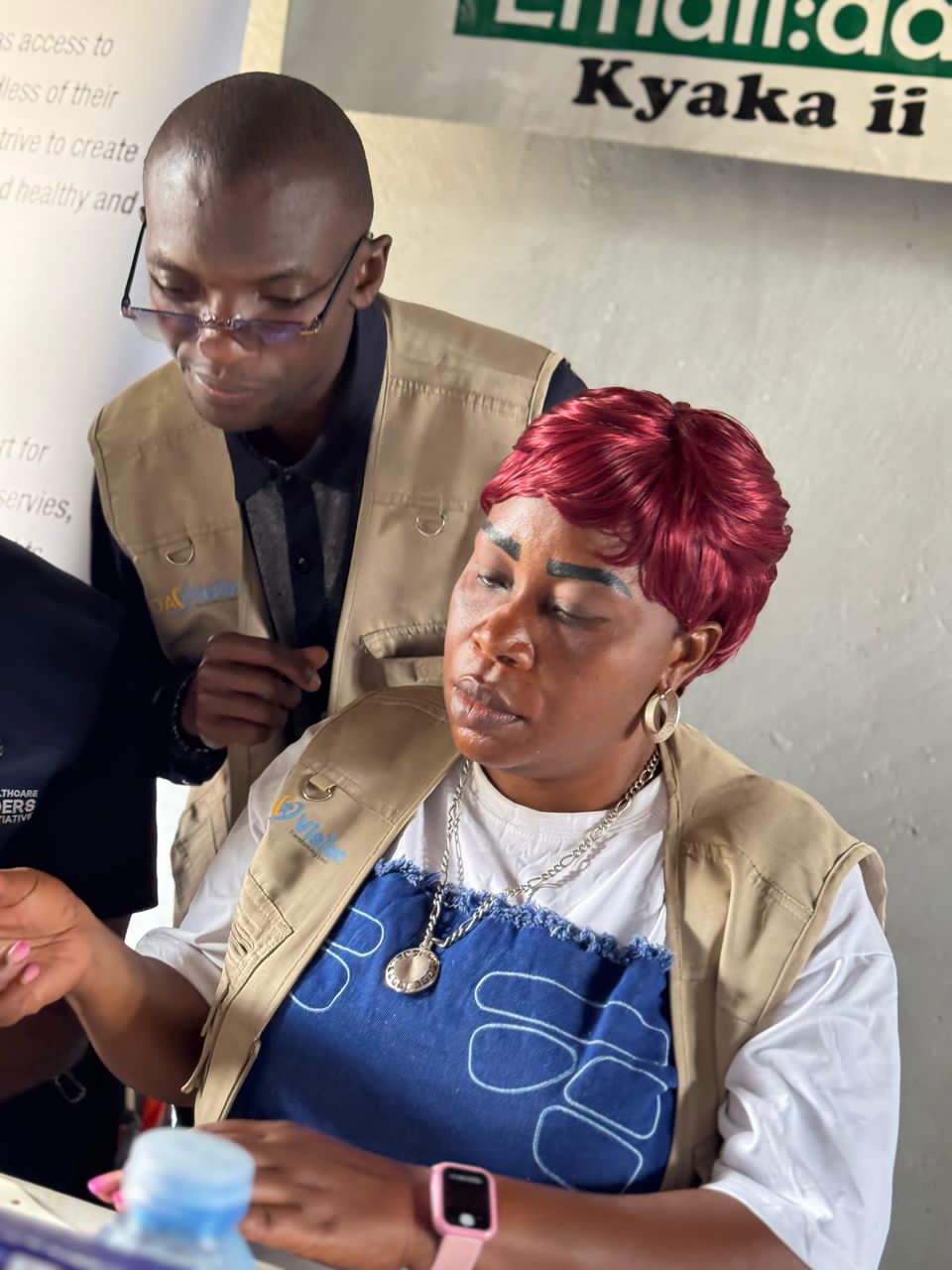 Healthcare worker taking blood pressure measurement