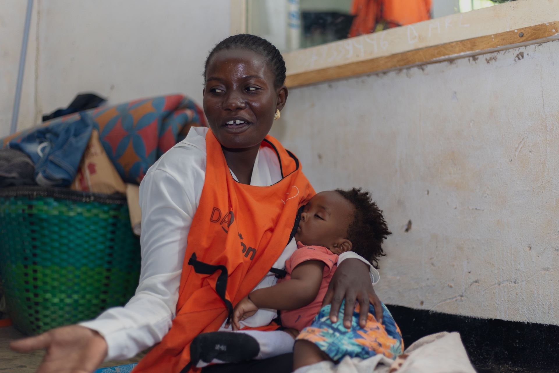 Community health worker providing maternal care